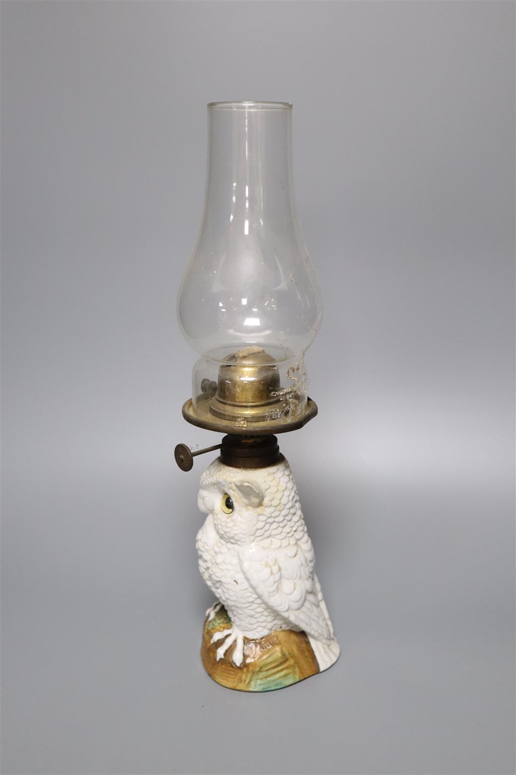 A Possneck porcelain owl novelty oil lamp, total height including chimney 37.5cm